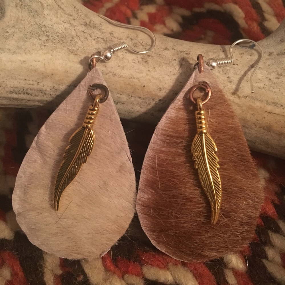 Tan cowhide earrings with gold feathers